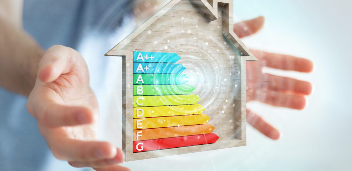 Businessman,On,Blurred,Background,Using,3d,Rendering,Energy,Rating,Chart 3C Ren Efficient Home Energy Image